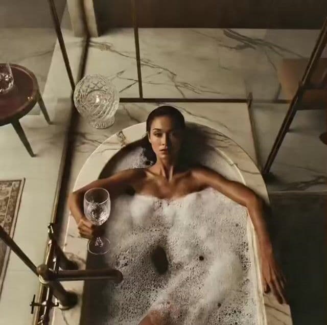 Cinematic Bathroom Scene: Woman Reclining in Bathtub (Part 1)