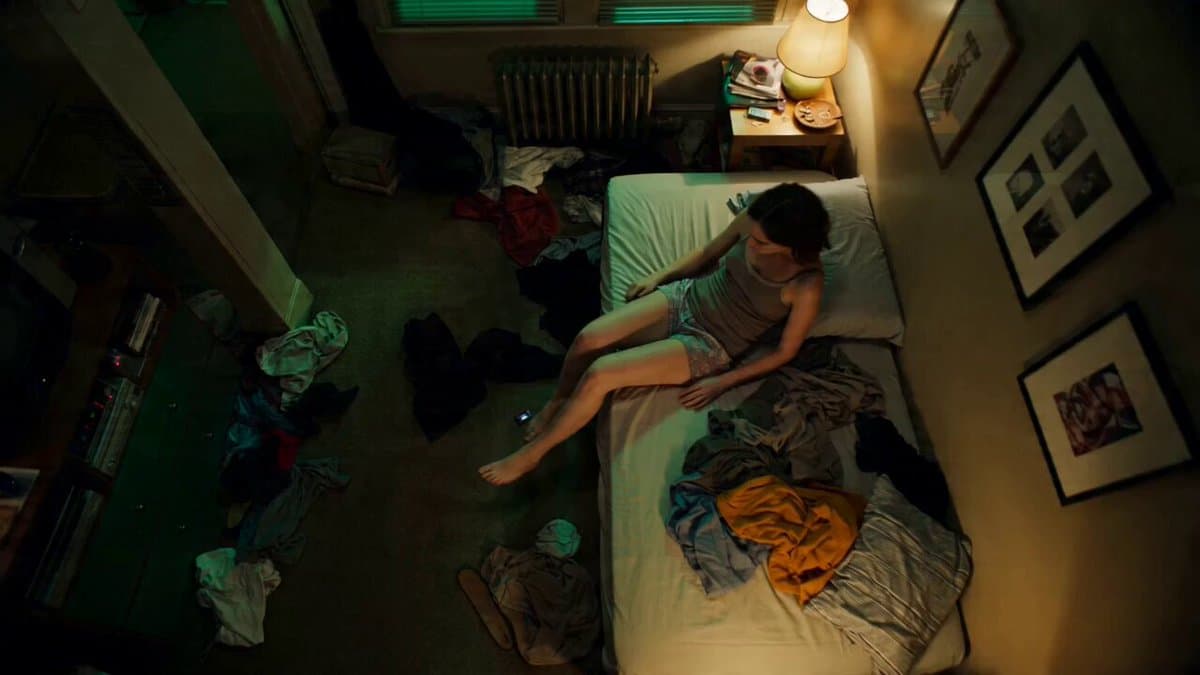 Seedance 2.0 Prompt: Tired Woman in a Cluttered Room