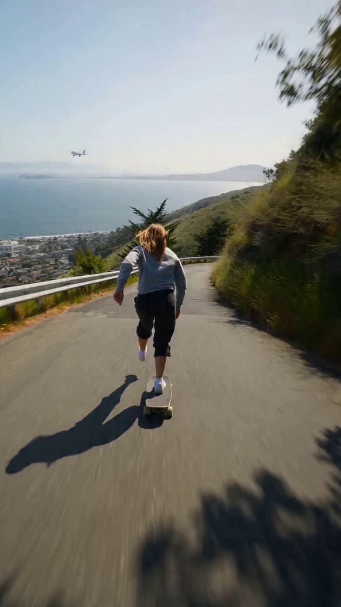 Ultra-realistic downhill skateboard ride with cinematic cinematography